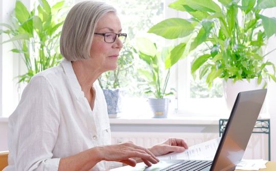 Women completing property management online form