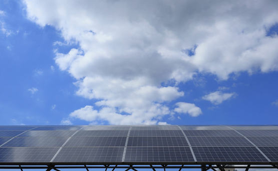 Solar panels under a blue sky 