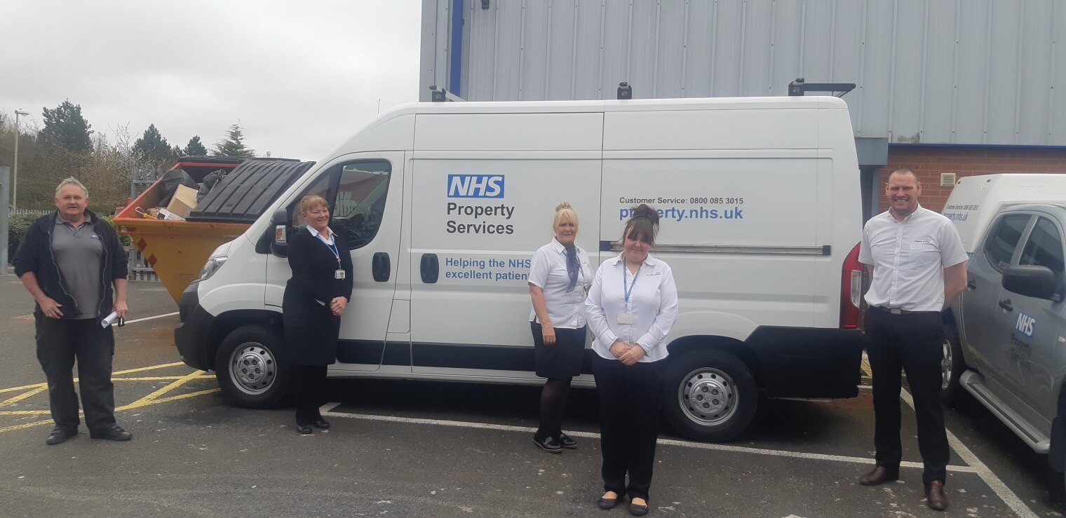 Image of Diane Cullen and team with NHS Property Services van