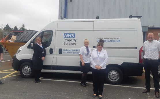 Image of Diane Cullen and team with NHS Property Services van