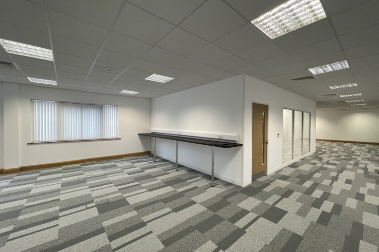 Internal image of Fusion House showing large open plan space and meeting room